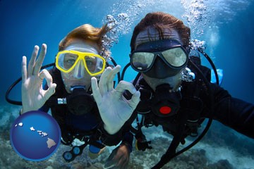 couple enjoying a scuba diving tour - with Hawaii icon