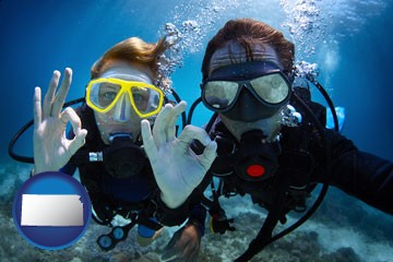 couple enjoying a scuba diving tour - with Kansas icon