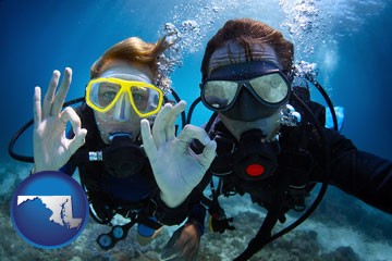 couple enjoying a scuba diving tour - with Maryland icon