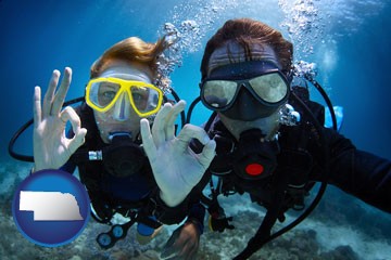 couple enjoying a scuba diving tour - with Nebraska icon