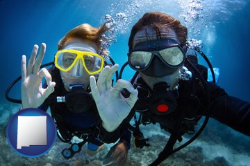 couple enjoying a scuba diving tour - with New Mexico icon